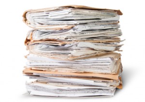 Old Files Stacking Up In A Messy Order